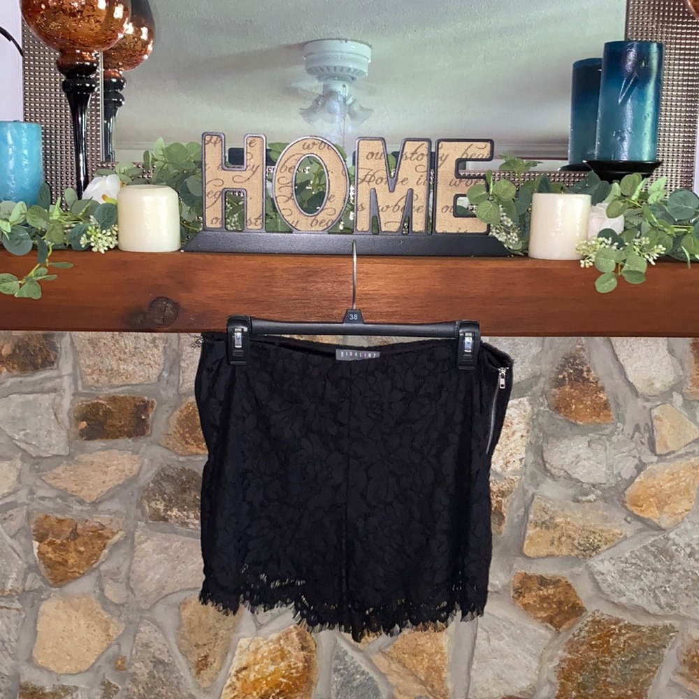 Black scalloped shorts